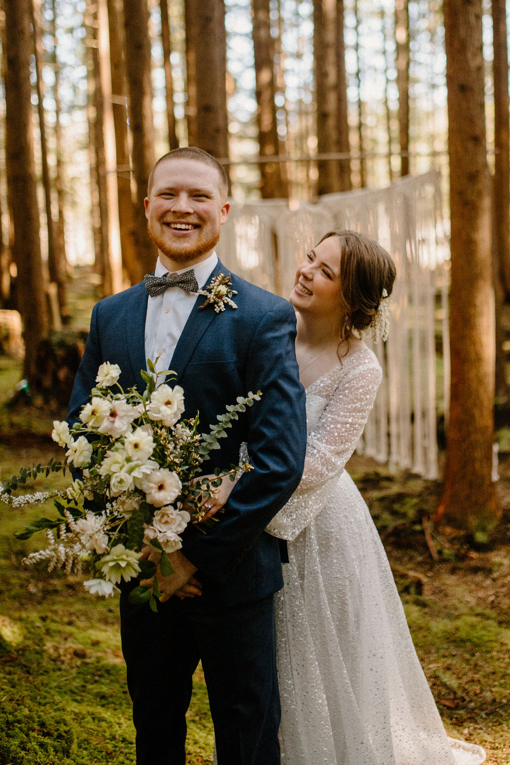 Beautiful Bride and Groom having a Washington elopement at the Emerald forest