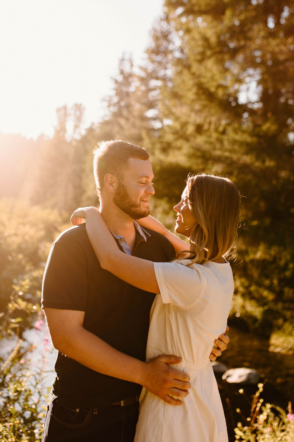 Gold Creek Pond Engagement Photos with dreamy backdrops and mountain views