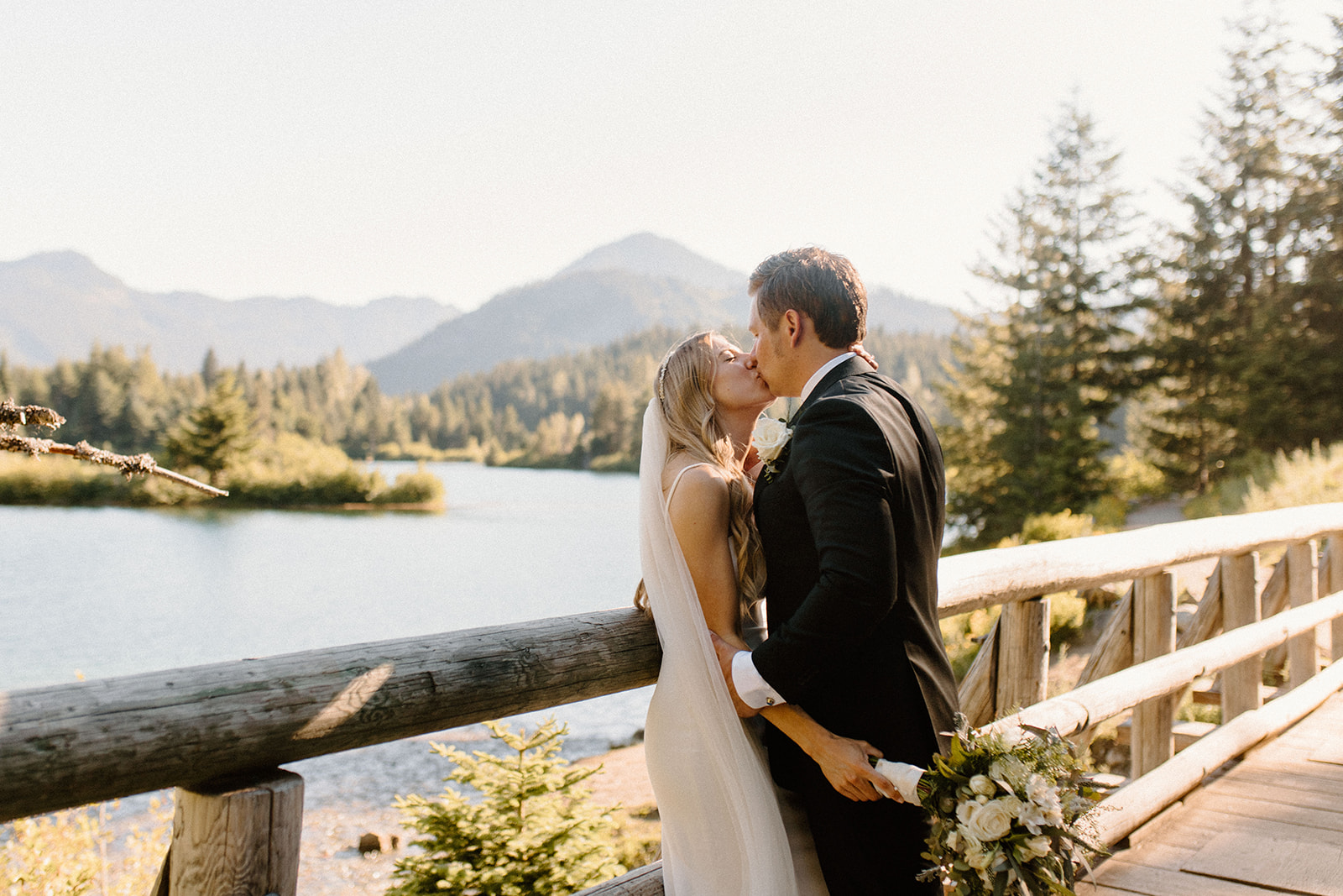 Bride and groom photos with beautiful backdrops for a Gold Creek Pond Elopement