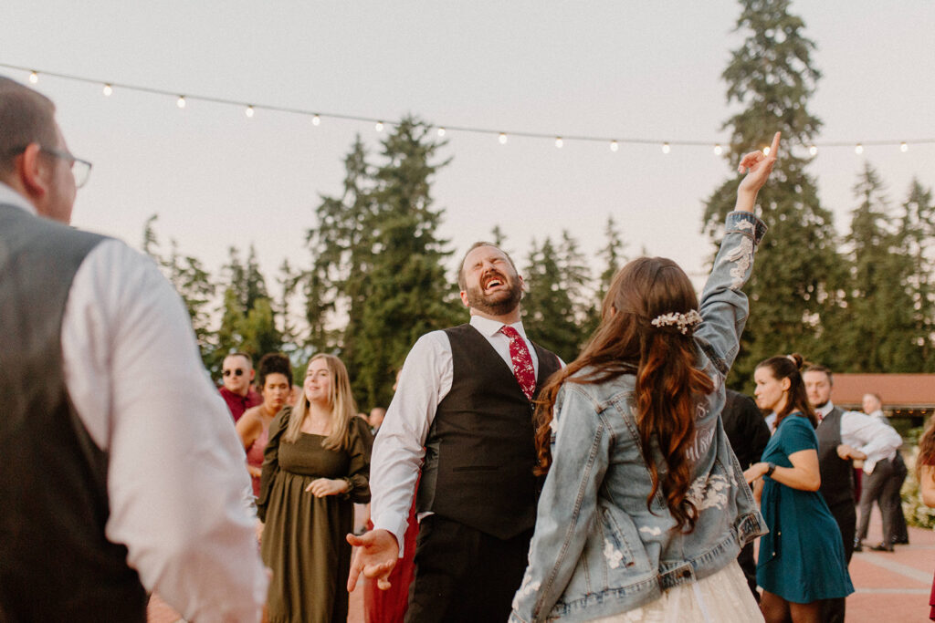 Bride and groom dancing and having fun on the wedding dance floor
questions to ask wedding vendors