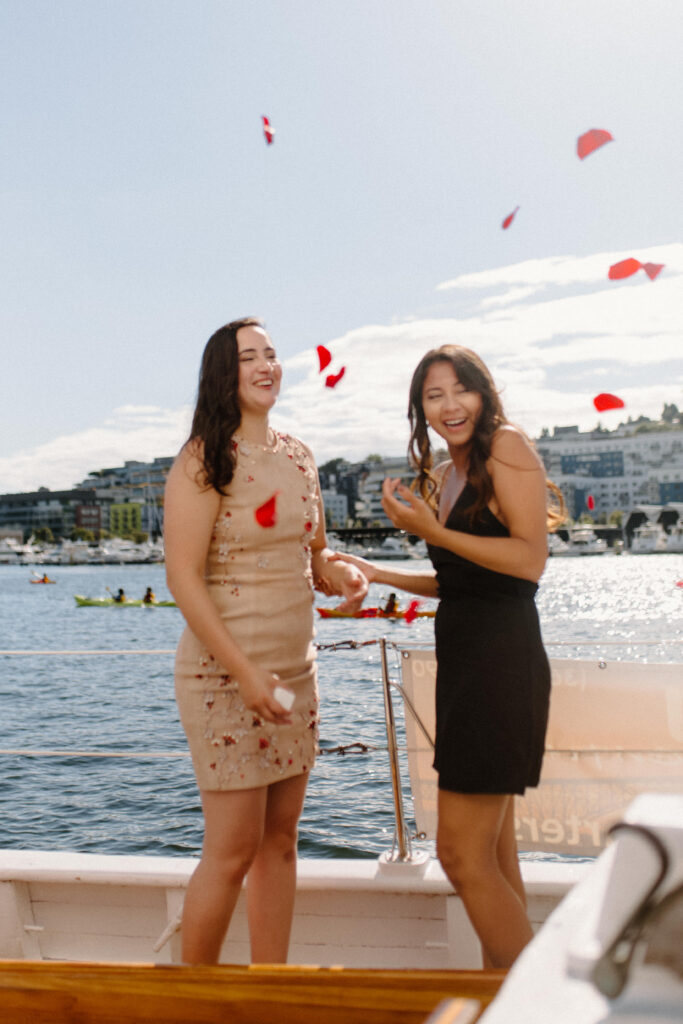 Two females just got engaged on a sail boat in lake union in seattle now needing wedding planning tips 