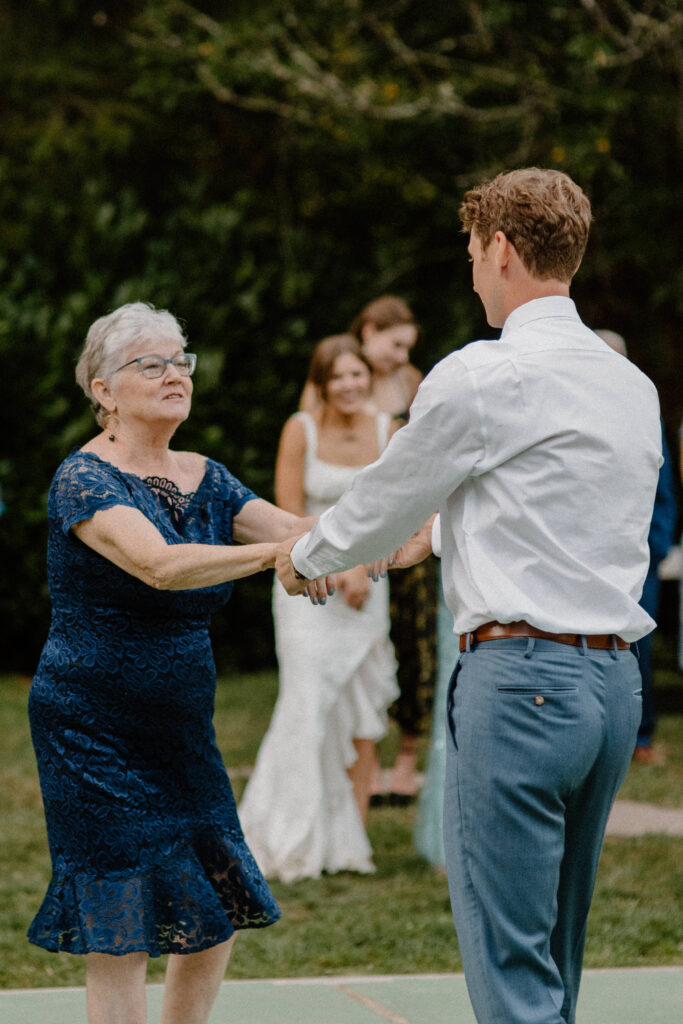 groom dancing with his mom