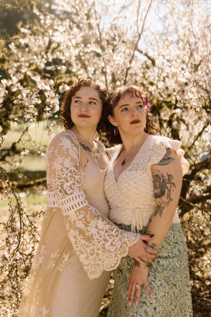 lesbian cherry blossom engagement photoshoot