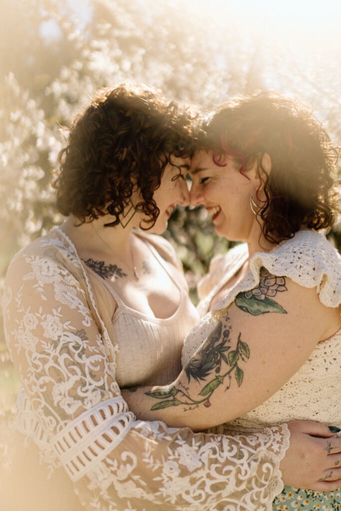 seattle cherry blossom lesbian engagement photoshoot