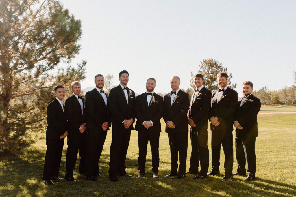 Country Colorado wedding groomsman photo