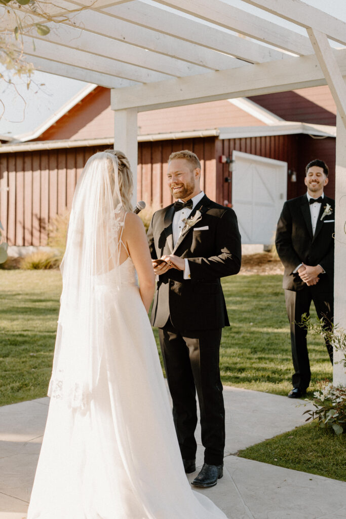 groom reading vows