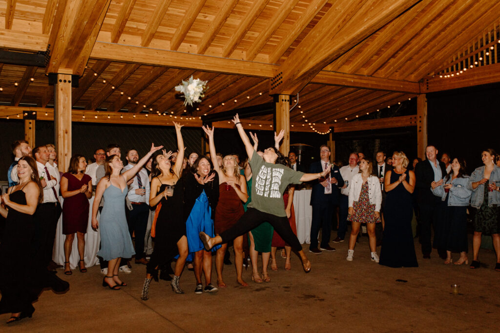 everyone running for the bouquet toss