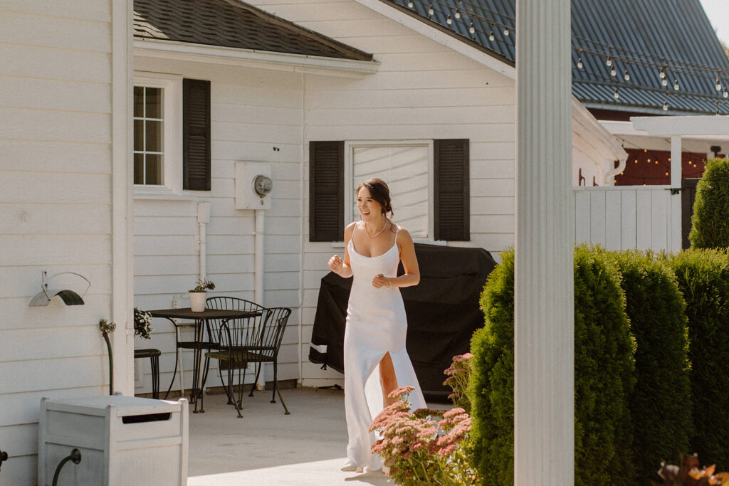 bride walking to first look