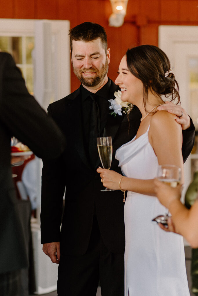 bride and groom mingling at reception