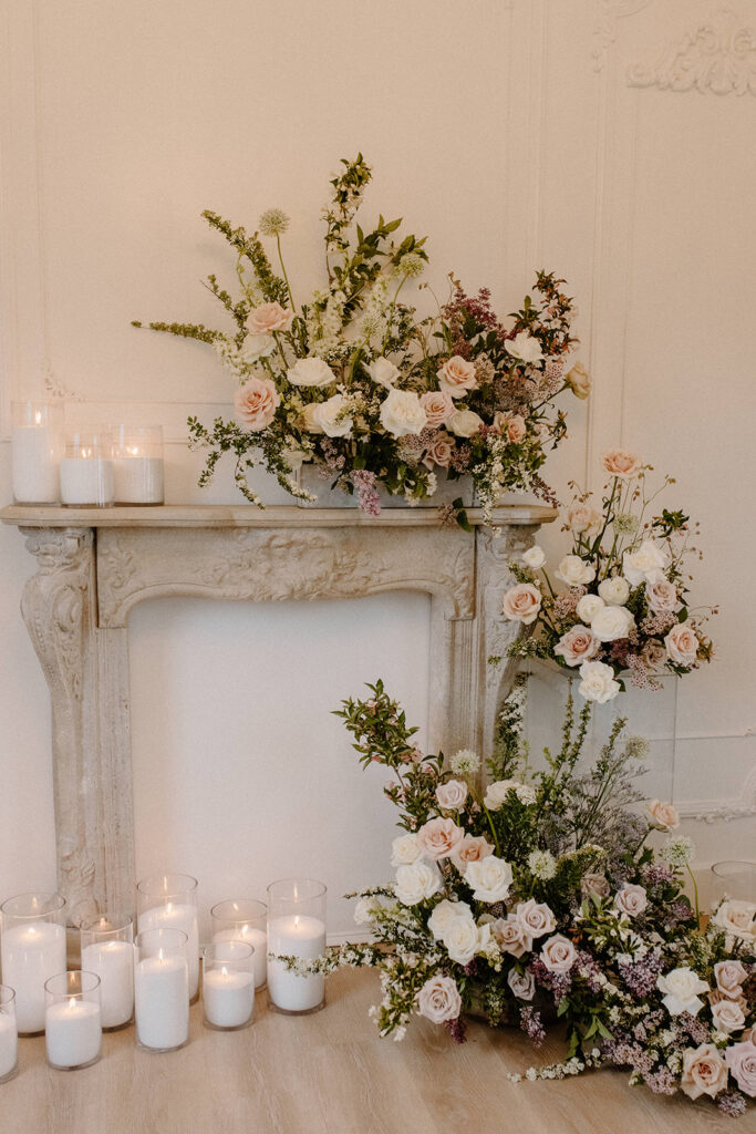 wedding florals on fireplace 