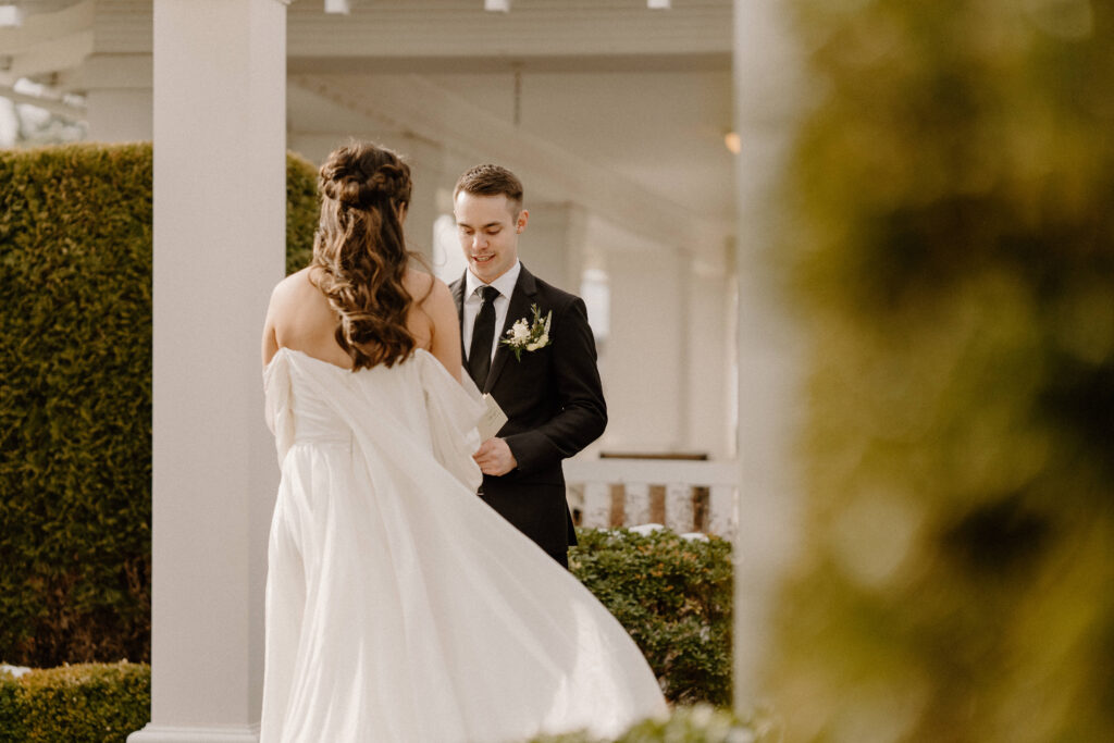 Bride and groom first look at winter wedding