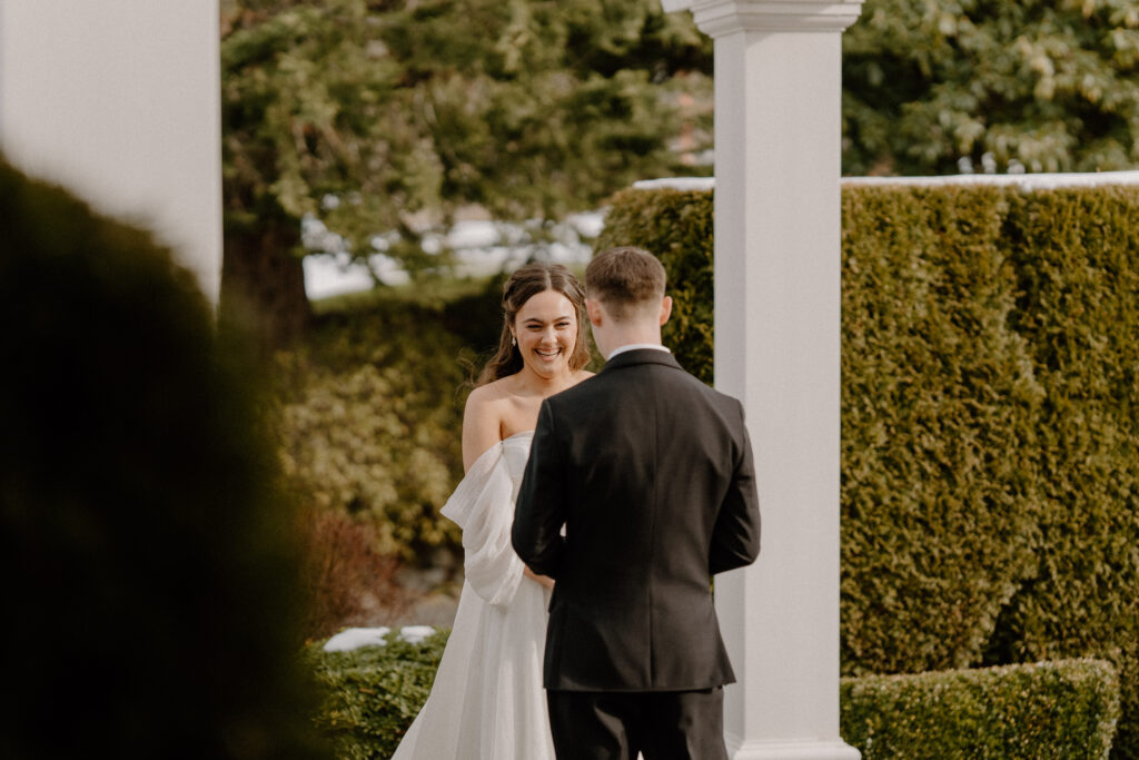 Bride and groom first look at winter wedding