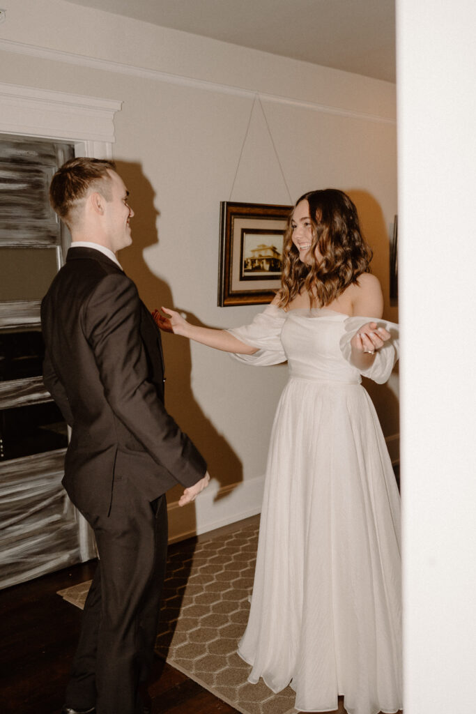 groom reaction to bride cutting her hair on wedding day