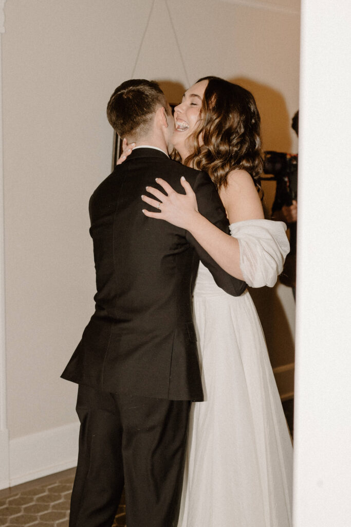 groom reaction to bride cutting her hair on wedding day
