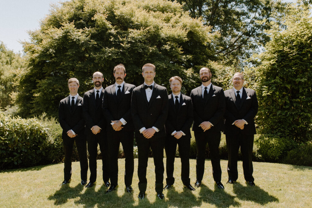 groomsman portraits in the garden