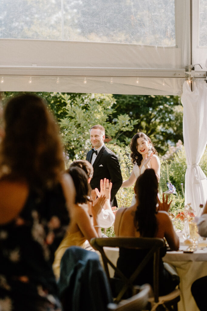 Twin Willow Gardens bride and groom entering Reception