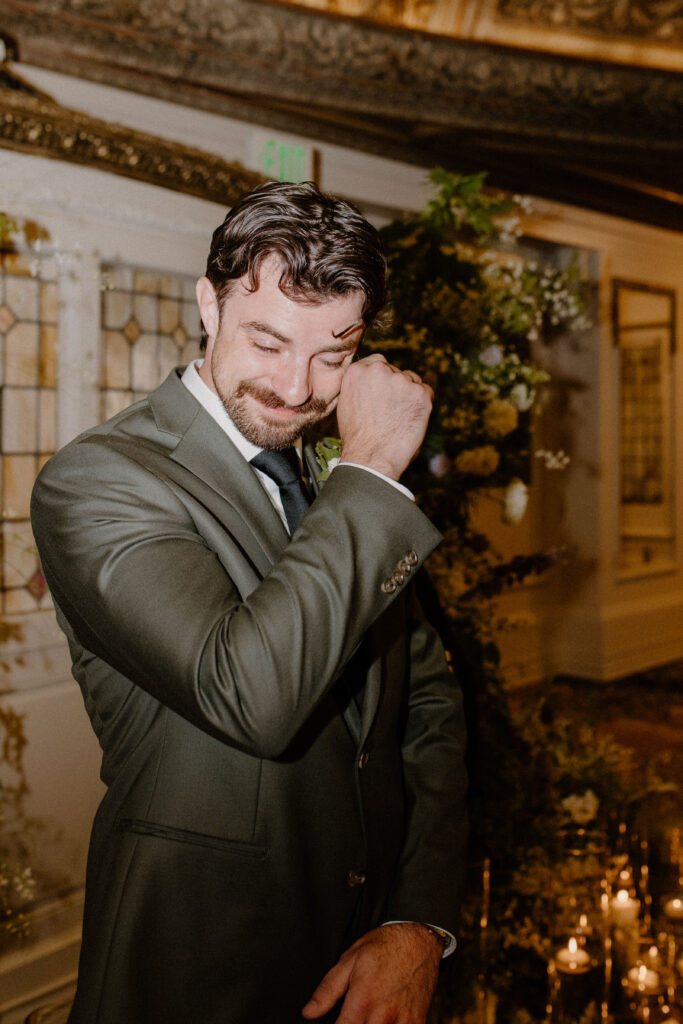 Groom tearing up as bride walks down the asile