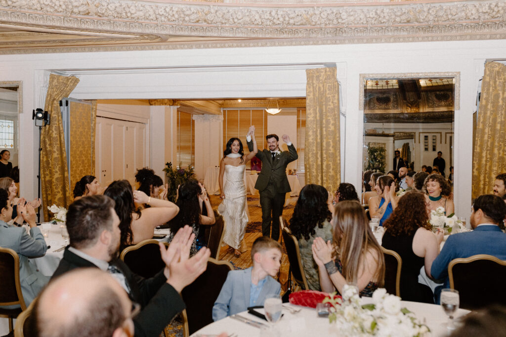 Bride and groom wedding reception entrance