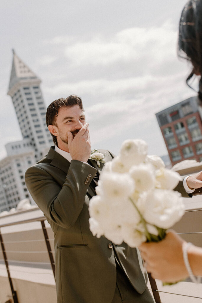 grooms reaction to bride on wedding day first look