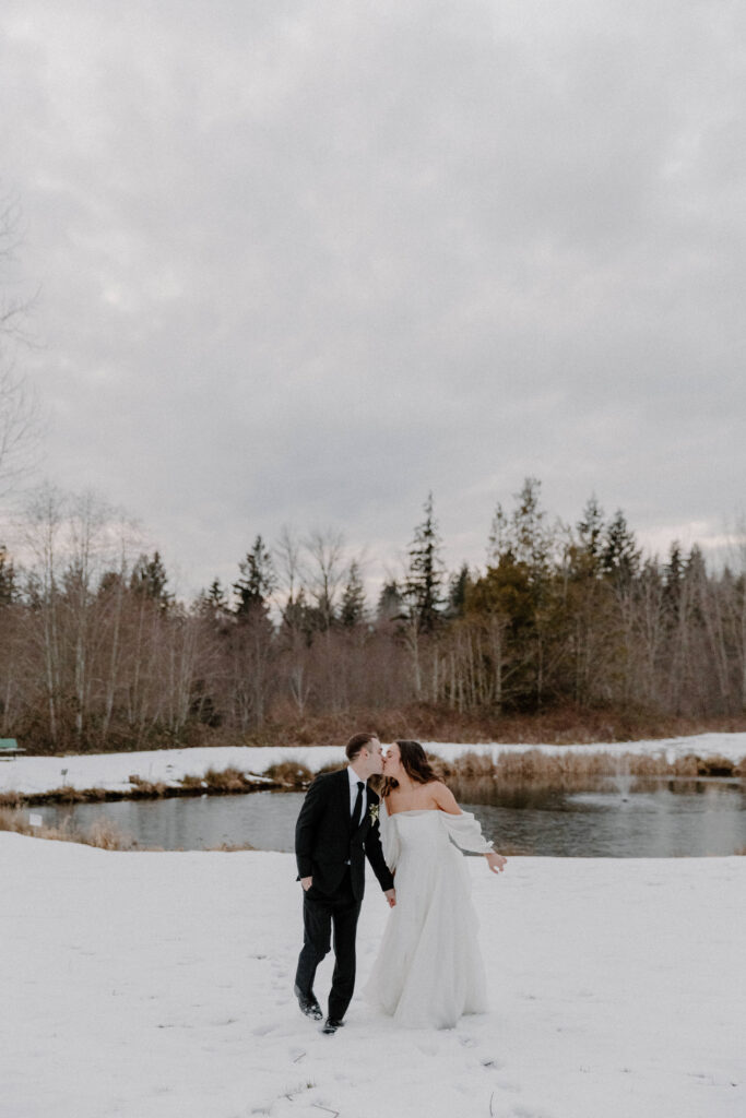 bride and groom snowy wedding portraits