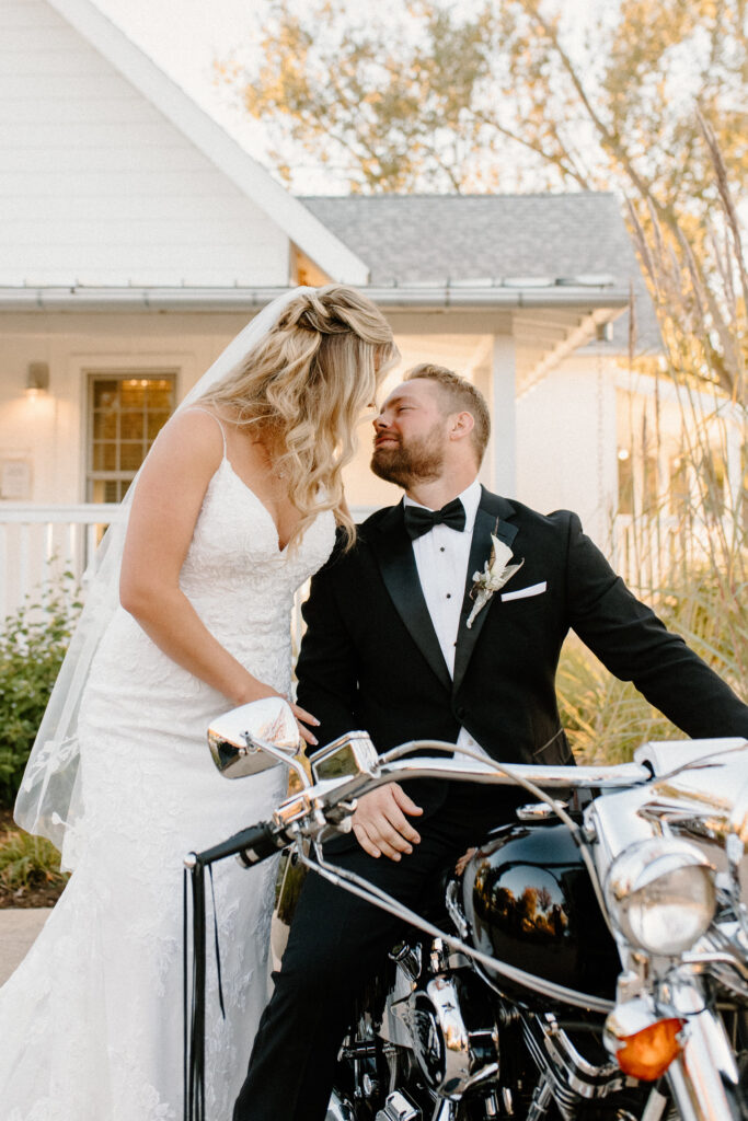 Bride and groom on motorcycle